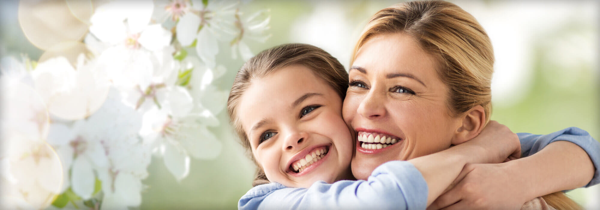 Mother and daughter hugging